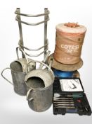 Two galvanised watering cans, a Parkside pneumatic chipping hammer in box, an aluminium bike rack,