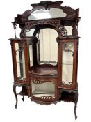 A late-Victorian carved mahogany mirror back display cabinet ,