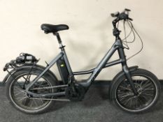 A Cube Compact E-Bike with battery pack charging cable and one key, frame 18 inches.