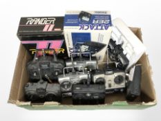 A group of remote control hand sets.