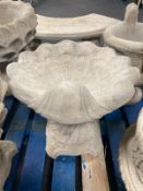 A concrete shell bird bath, height 39cm.