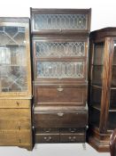 An Edwardian oak and leaded glass stacking bookcase, 85cm w x 44 d x 220 h.