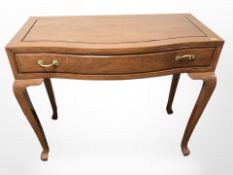 A contemporary Chinese elm serpentine front single drawer side table, 92cm w x 45cm d x 77cm h.