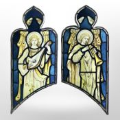 A pair of angel musicians, a lutenist and trumpeteer, two trapezoidal stained,