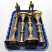 Two pairs of Victorian brass candlesticks and two figures of miners.