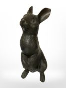 A contemporary hollow-cast bronze figure of a rabbit, height 29cm.