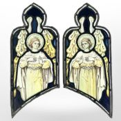 A pair of angels, two trapezoidal stained, painted and leaded glass windows with ogee pediments,