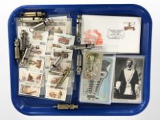 A group of police whistles, reproduction John Player cigarette cards, Masonic post cards, etc.