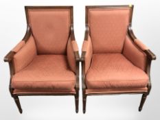 A pair of reproduction mahogany salon armchairs in the Regency style, width 68cm.