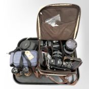 A Chinon CM-4S with Chinon zoom lens f=28-50mm,