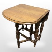 An oak gate leg table,