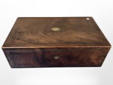 A Victorian brass-inlaid mahogany writing slope.
