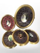 Five gilt-framed montages of pennies from the reigns of British monarchs,