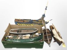 A partially built scale model battleship, length 76cm,