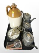 A 19th-century stone ware flagon, pewter tea wares, a circular wall timepiece, brass trivet,