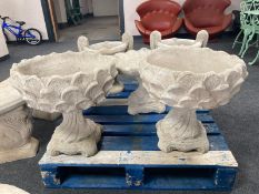 A pair of concrete 'pineapple' planters, height 49cm.