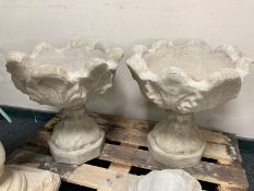 A pair of concrete pedestal planters, height 46cm.