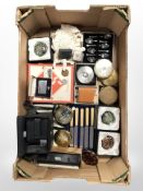 A quantity of compacts, cased EPNS teaspoons and butter knives, vintage lighter, Monopoly game,