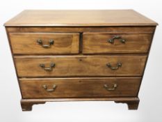 A George III inlaid mahogany four drawer chest,