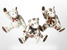 Three Royal Crown Derby seated teddy bear paperweights, tallest 7cm.