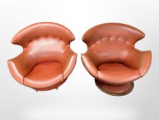 A pair of 1970's Italian faux leather lounge chairs,