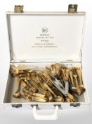 A quantity of German gold-plated cutlery.