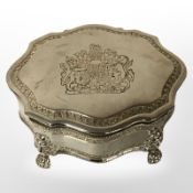 A contemporary silver-plated jewellery casket with royal crest, width 16cm.