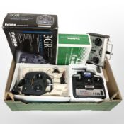 A group of remote control hand sets.