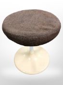 A 1970's circular stool on fibreglass support, height 46cm.