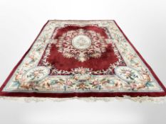 A Chinese carpet on red ground,