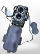 A Rolleiflex TLR baby grey medium format camera with Schneider Kreuznach Xenar 1:3.5/60 lens.