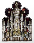 A stained glass ogee panel, decorated with Gothic columns against a red backdrop, 79cm by 61cm.