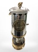 An Eccles Protector Type 6RS chrome and brass miner's lamp.