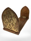 A Victorian brass-mounted book slide.