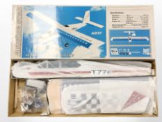 A Rising Star scale model remote-controlled plane, and another remote-controlled aeroplane,