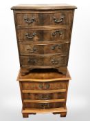 A reproduction yew wood three drawer low chest, 50cm width, and a similar walnut four drawer chest.