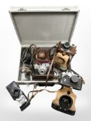 A Werra 1 35mm camera with Carl Zeiss Jena Tessar 2,8/50 lens. A Zorki-4K with a Hoya 40.