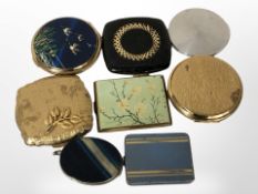 Eight vintage powder cases.