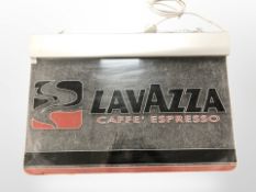 A Lavazza metal and perspex advertising sign, width 77cm.