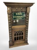 A carved oak clock case with later King Edward Cigars advertising, height 74cm.