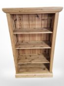 A modern pine open bookcase,