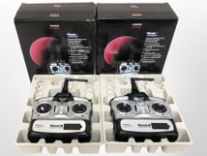 Two Planet T5 Advanced 2.4 GHz radio control hand sets, both boxed.