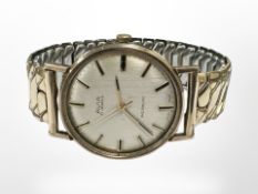 A gent's 9ct gold Avia wristwatch on plated expanding strap.