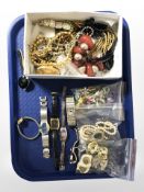 A group of modern lady's wristwatches, simulated pearls, costume earrings, necklaces, etc.