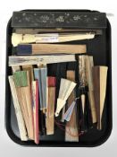 A quantity of oriental hand fans.