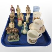 A group of plaster nativity figurines and several items of 20th-century royal commemorative china.