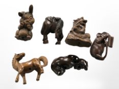 Six Japanese carved fruit wood netsukes, tallest 5cm.