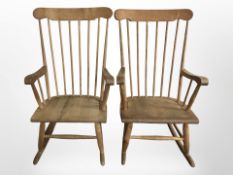A pair of Gefco spindle back rocking chairs.