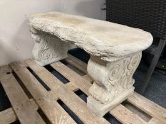 A concrete rustic garden bench on classical supports, width 99cm.