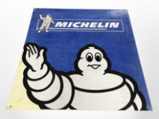 A reproduction Michelin tin sign, 75cm x 75cm.